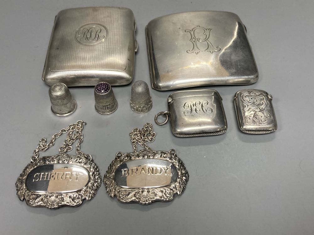 Two silver cigarette cases including late Victorian with military related inscription, two silver vesta cases, etc.